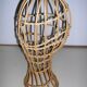 Model head in rattan