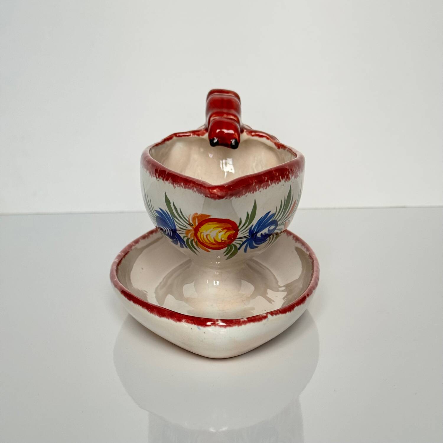 Henriot Quimper sauceboat – flower decoration & lobster-shaped handle