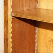 Pair of Sheraton Revival bookcases in satinwood, walnut, and yew.