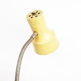 Articulated desk lamp in yellow metal