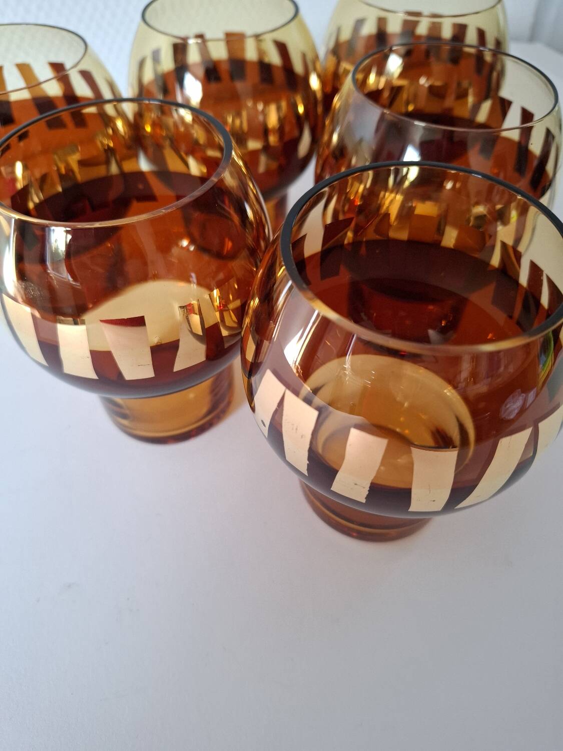 Carafe and its amber/golden glasses from the 70s.