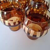 Carafe and its amber/gold glasses from the 70s