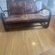Vintage colonial-style bench in solid wood and patinated leather.