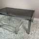 Table basse chromée et verre fumé années 70