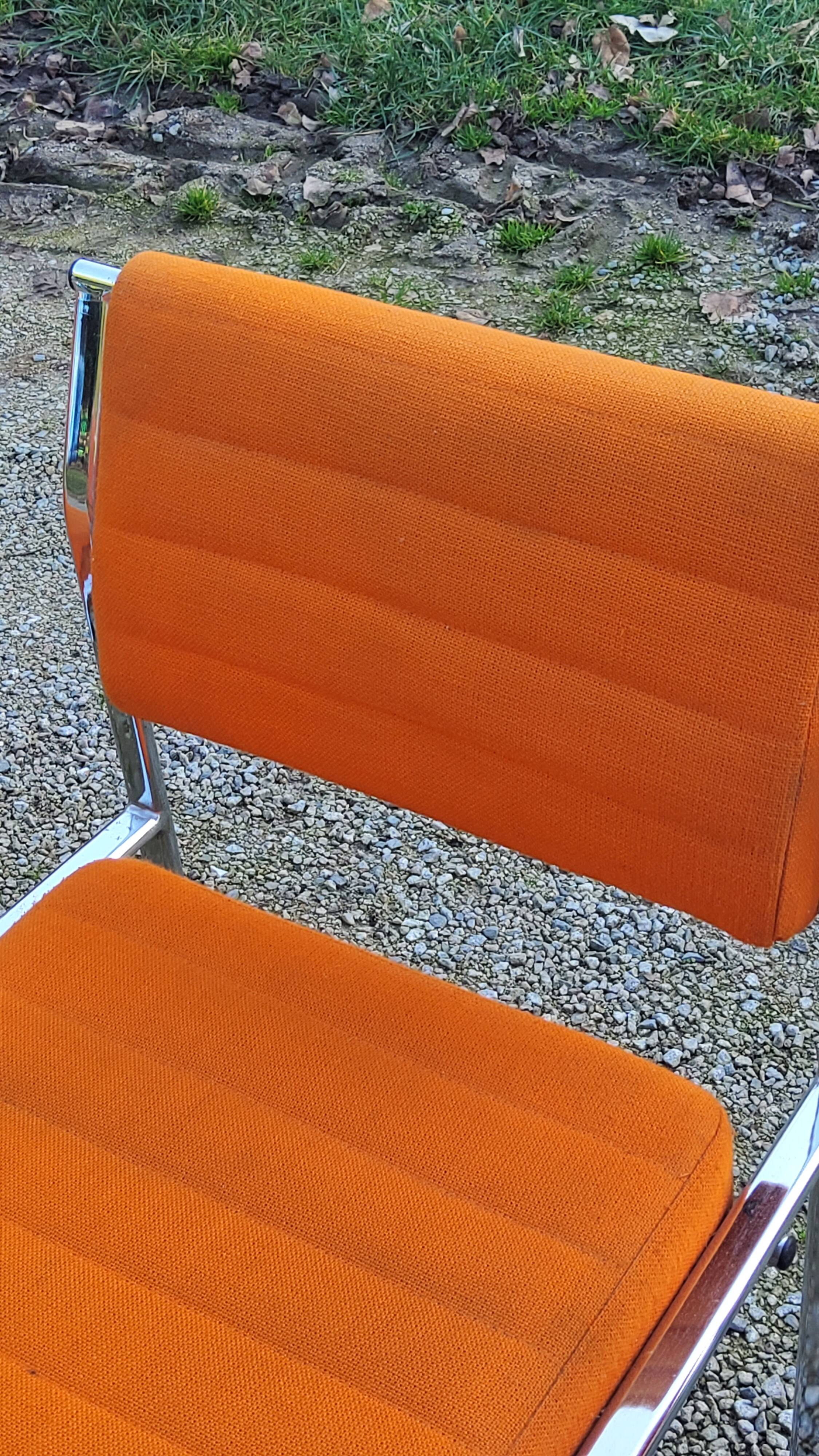 Set of 6 designer chairs from the 70s orange fabrics and chrome tubes