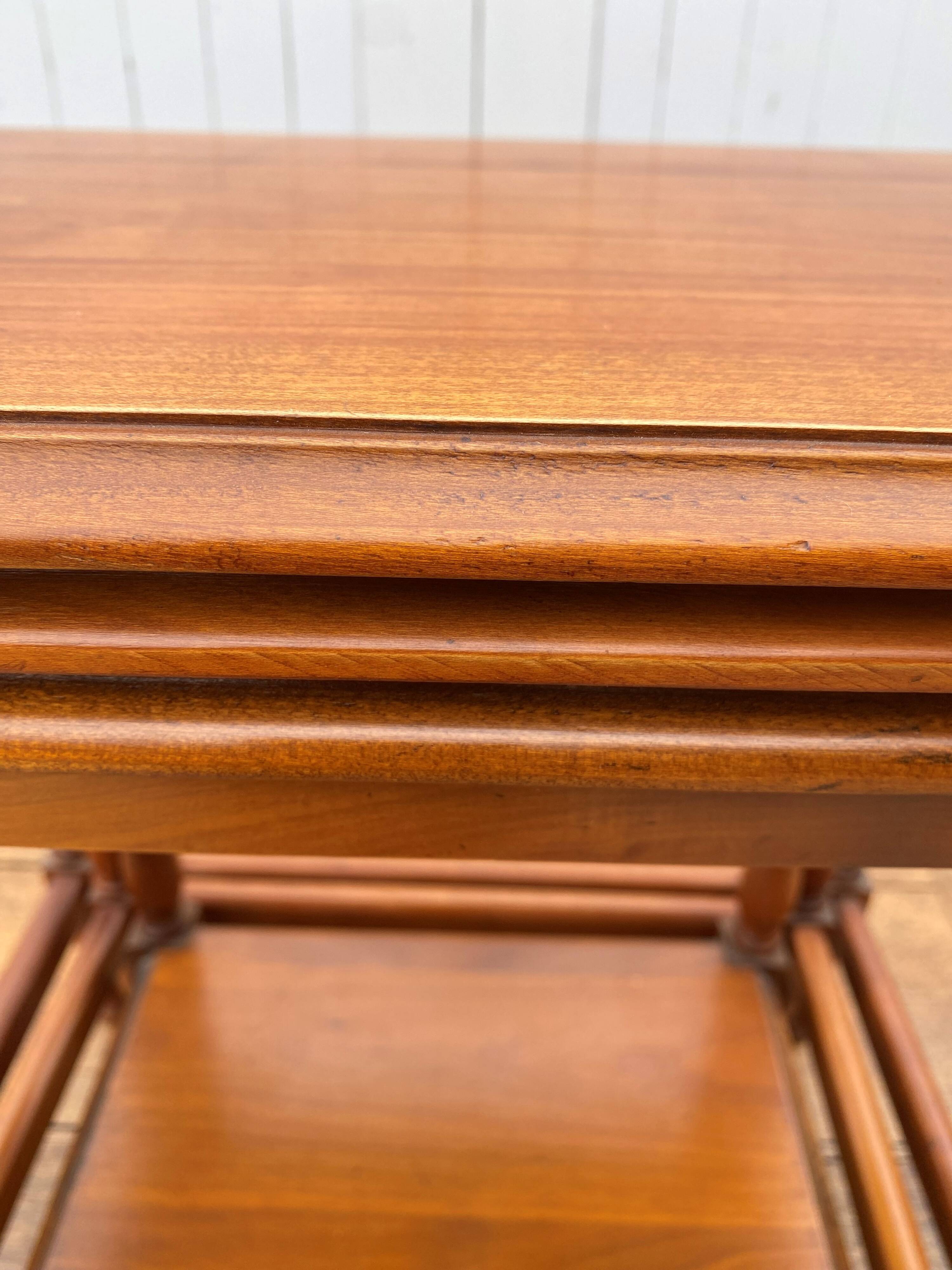 Set of 3 rustic cherry wood nesting coffee tables from the 1950s.