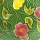 Plat en barbotine sarreguemines decor floral