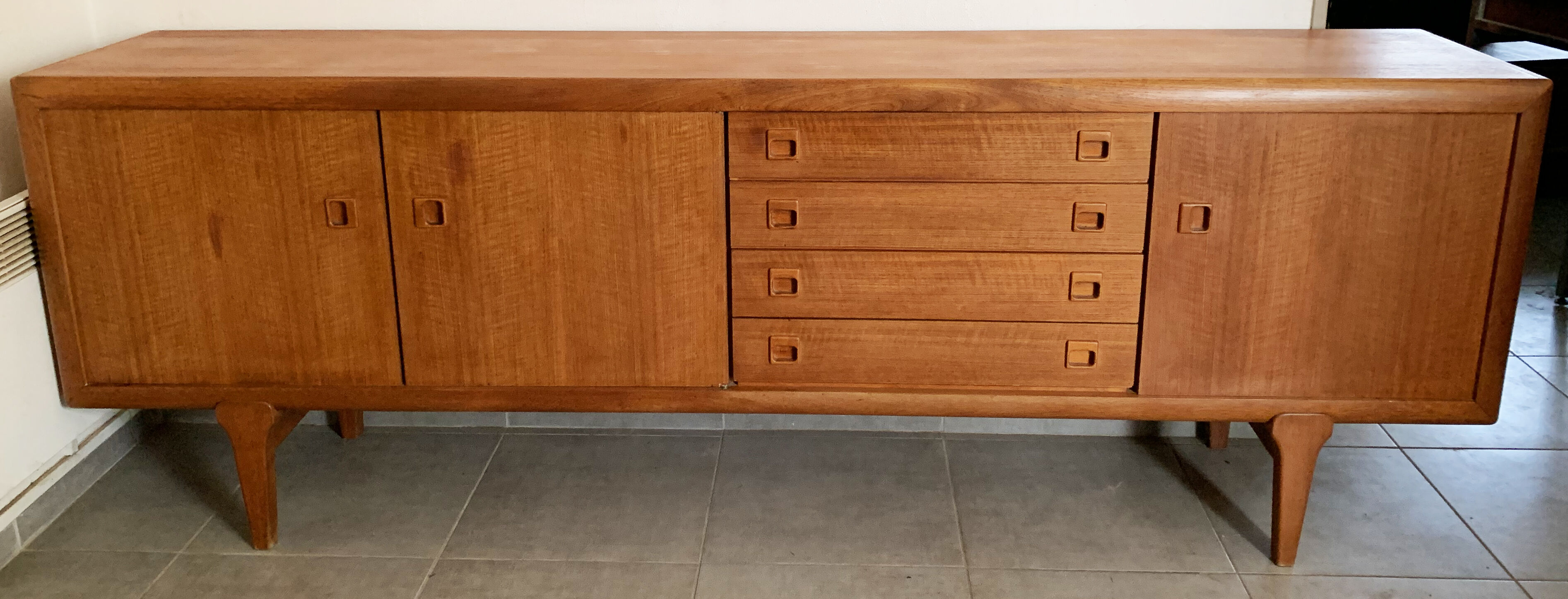 Large Danish vintage row in blond teak from the 60s