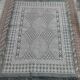 Handmade gray and white rug in natural wool