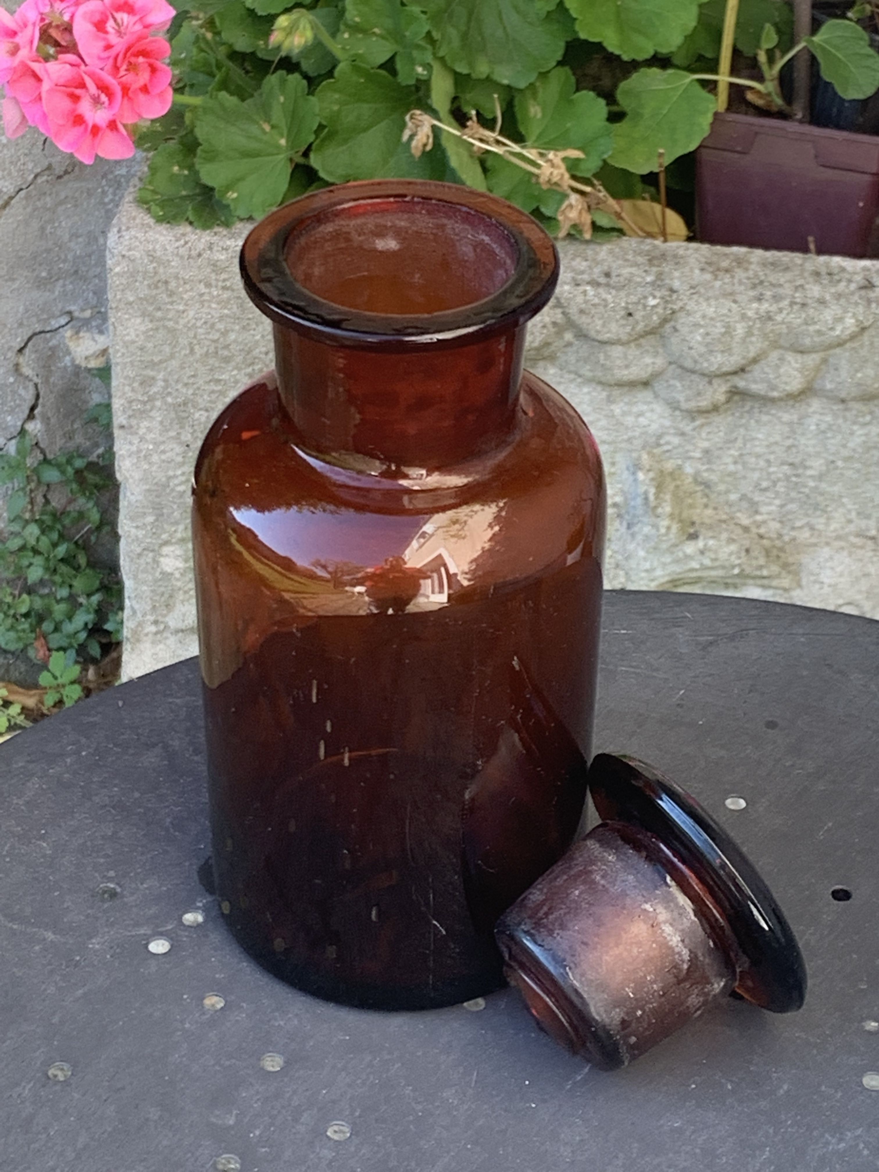 Jar bottle of herbalism pharmacy in amber colored glass art deco
