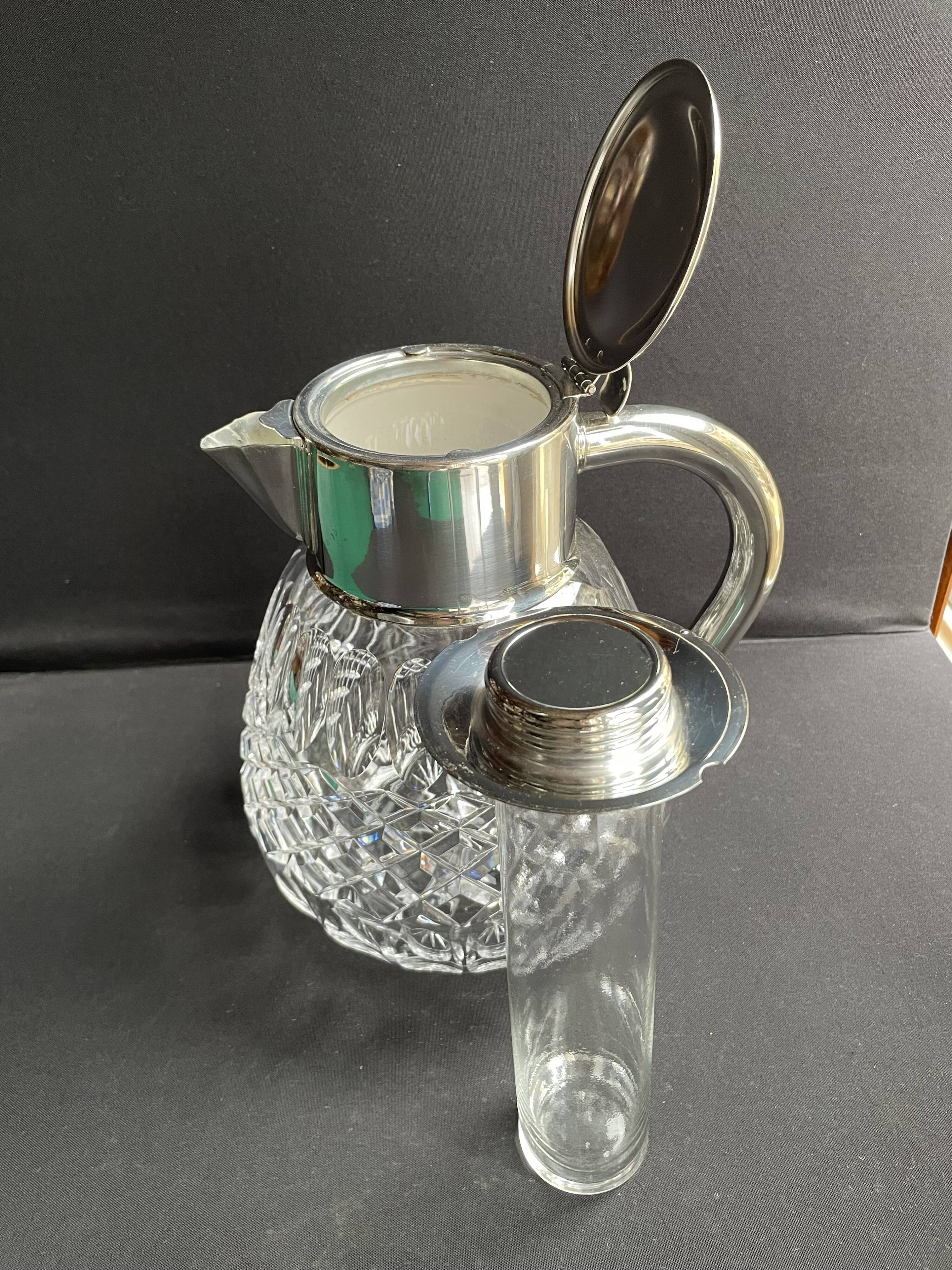 Important jug with ice reserve in cut crystal and silver-plated metal