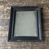 19th century blackened mirror with pitted glass 34cm x 40cm