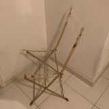 Folding chair in plexiglass and brass