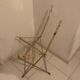 Folding chair in plexiglass and brass
