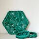 Trio of barbotine art deco coasters and bottle coasters
