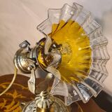 1920 bronze and brass rocking lamp with translucent amber-colored shade