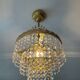 Chandelier with crystal and brass pendants
