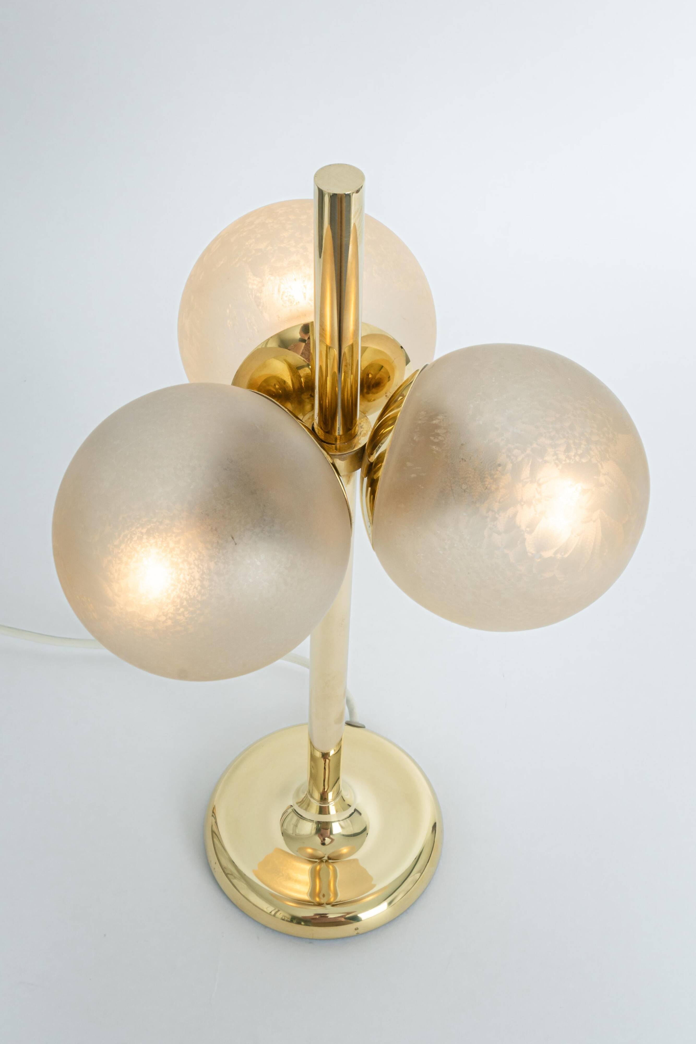 Pair of large brass table lamps by Kaiser, Germany, 1970s.