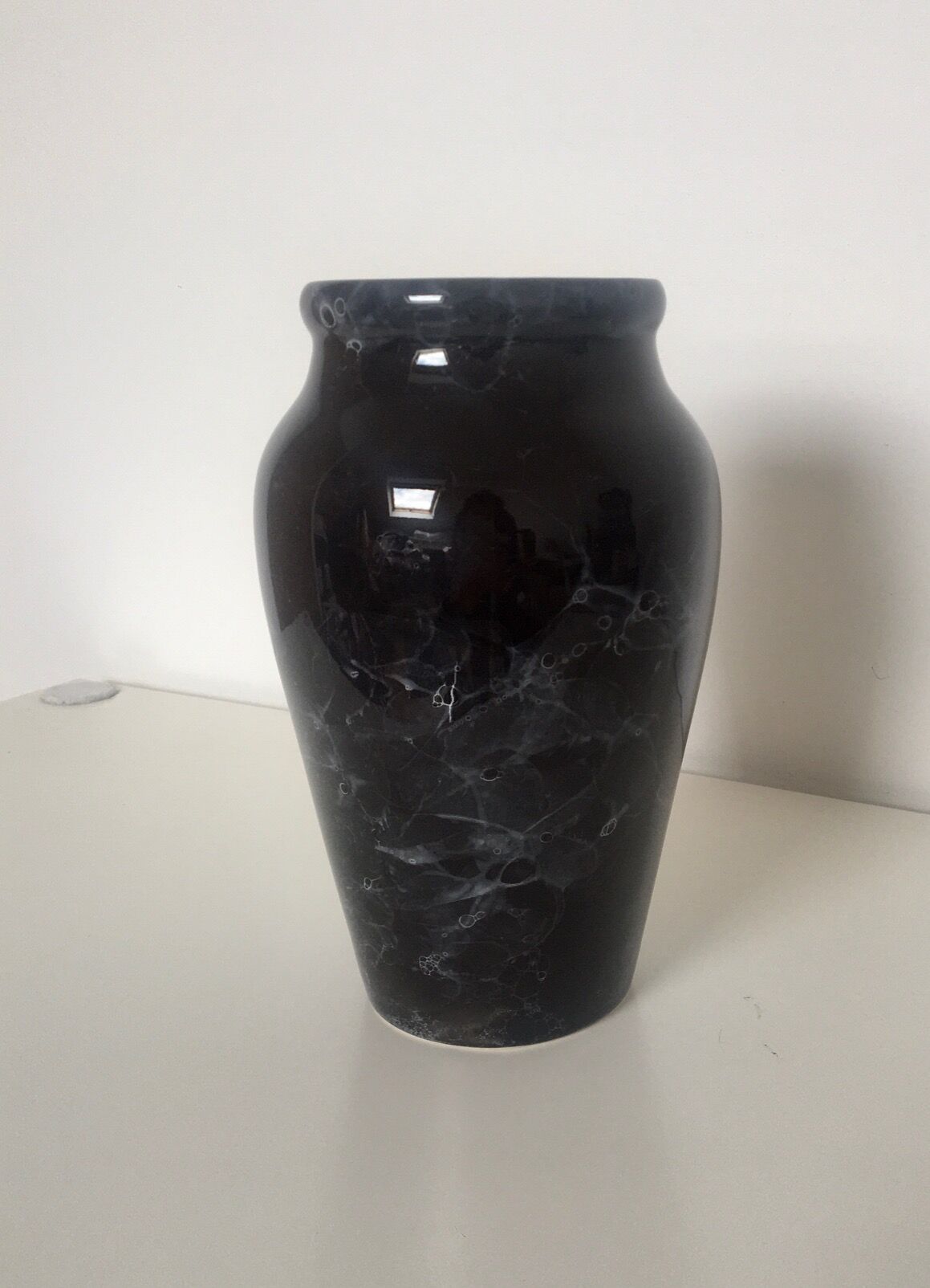 Marbled black faience vase