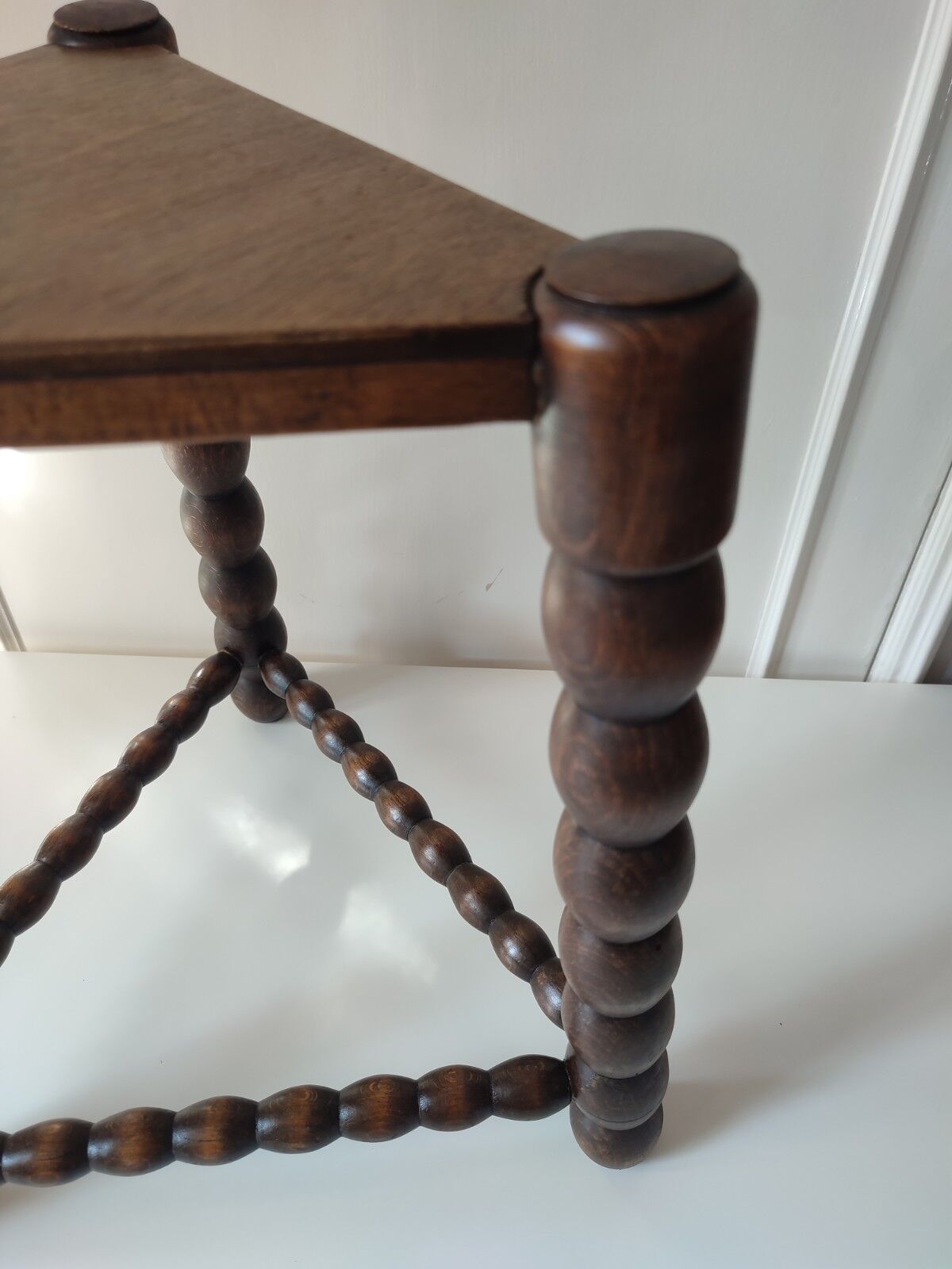 Wood tripod sofa end