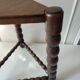 Wood tripod sofa end