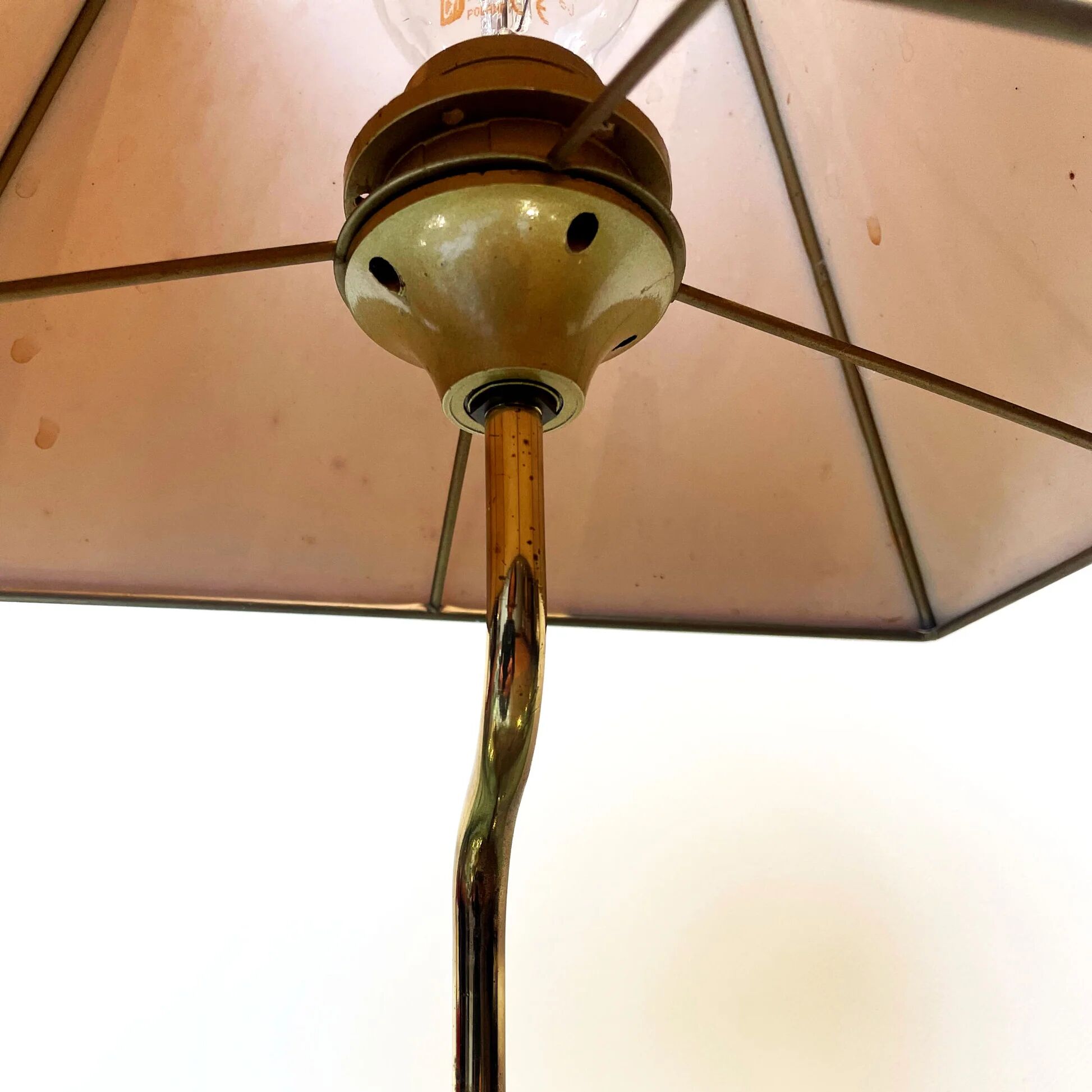 Vintage brass table lamp in the shape of a duck from the 1970s on an acrylic base.