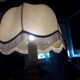 Turned wood table lamp with “skin” shade