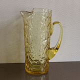 Pitcher in crumpled glass