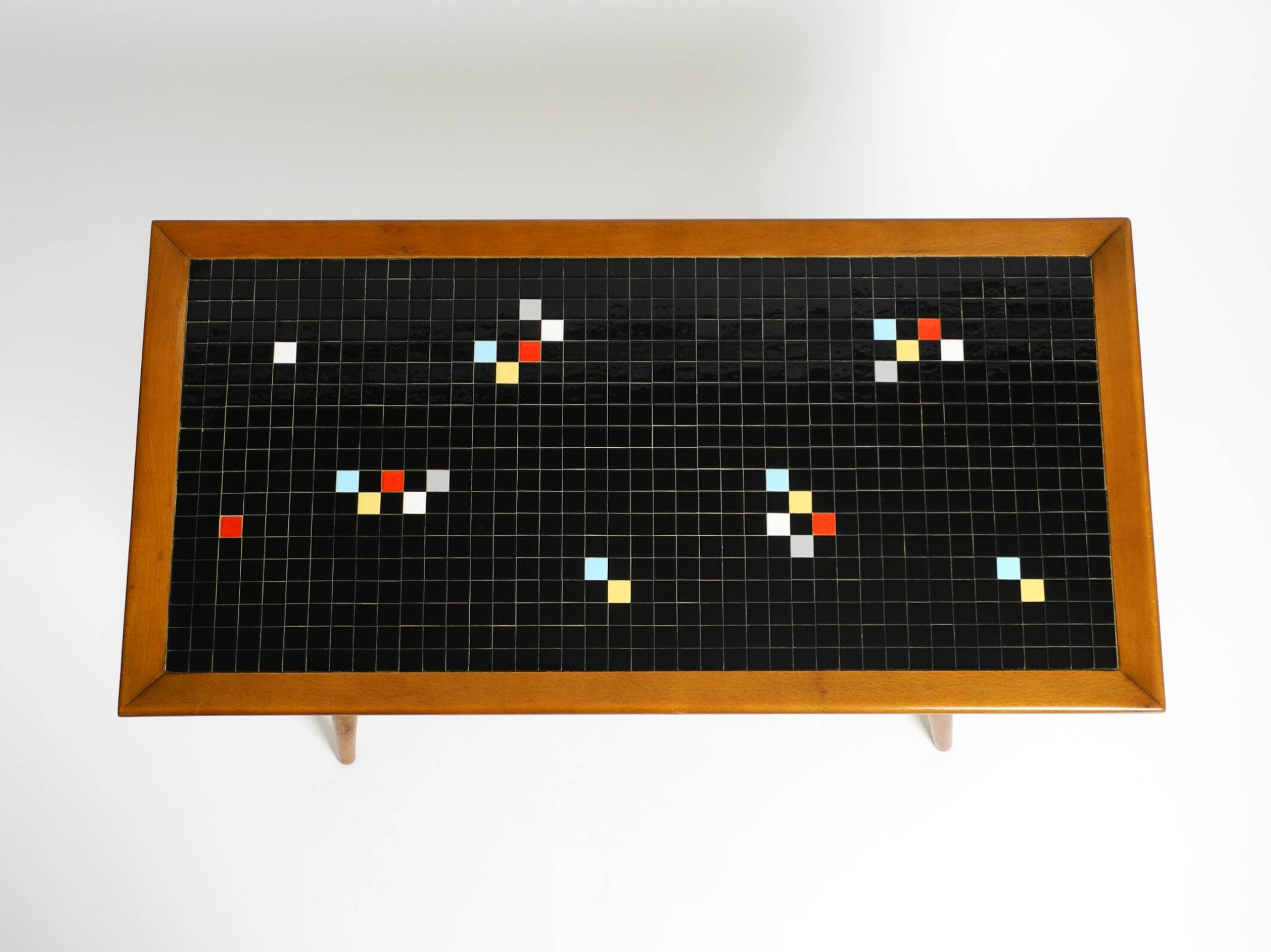 Beautiful long Mid Century walnut wood coffee table with a mosaic surface