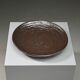 Large handmade metallic glazed ceramic bowl, circa 1980s–1990s.