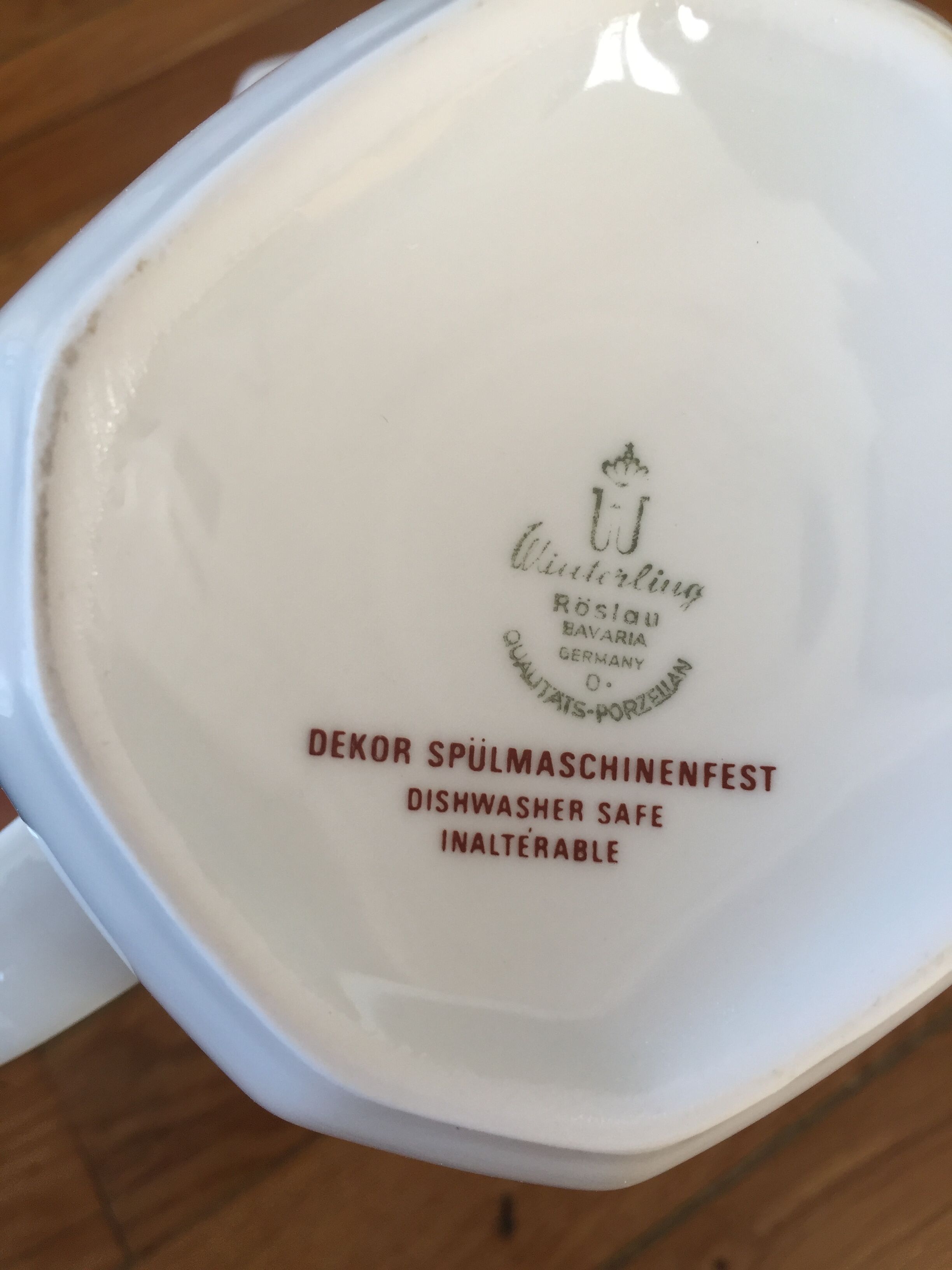 Vintage porcelain coffee or teapot with milk jug