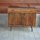 Scandinavian commode in brown rosewood from the 1960s, with 1 drawer and 2 doors.