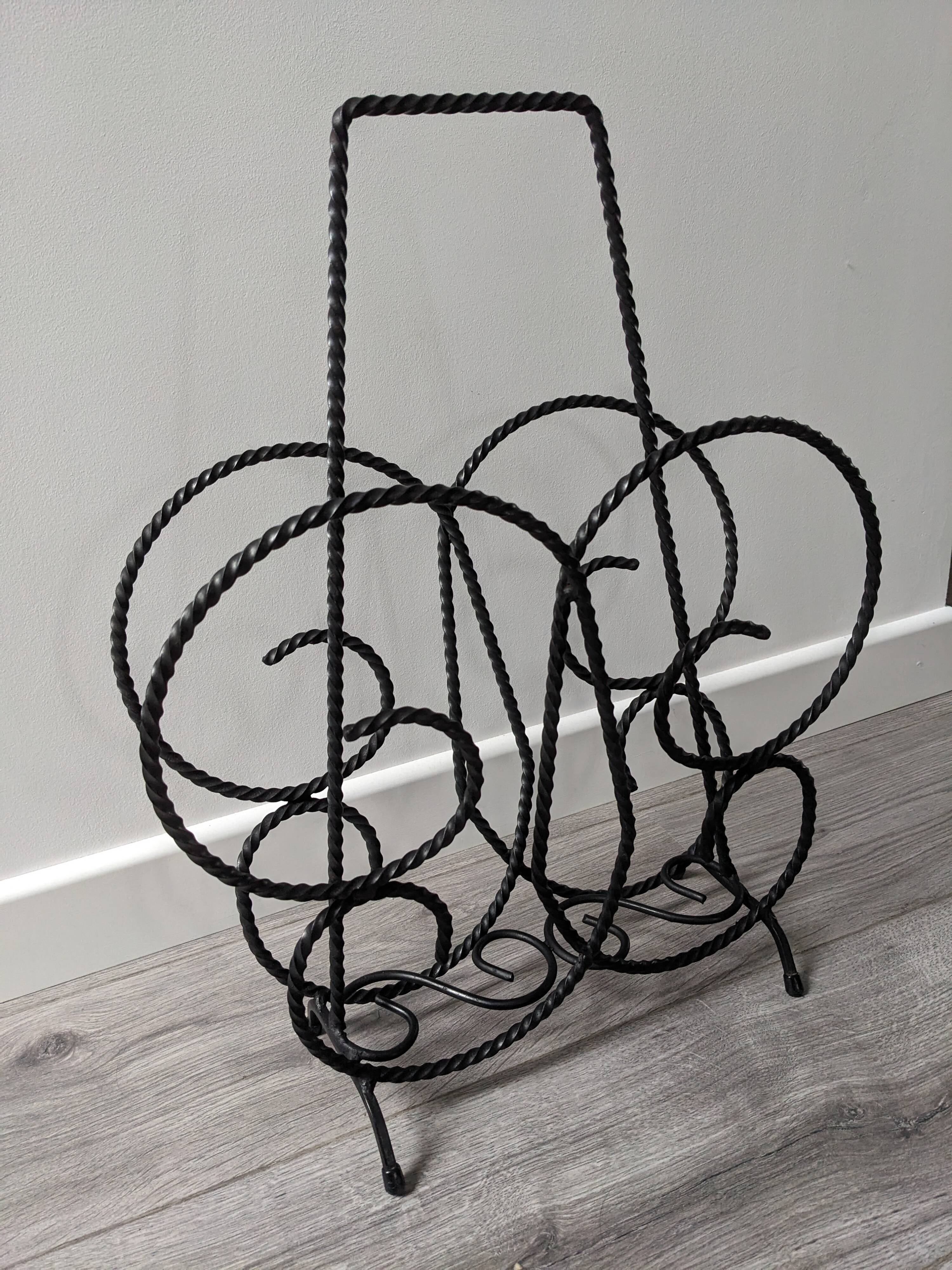 Vintage wrought iron magazine rack