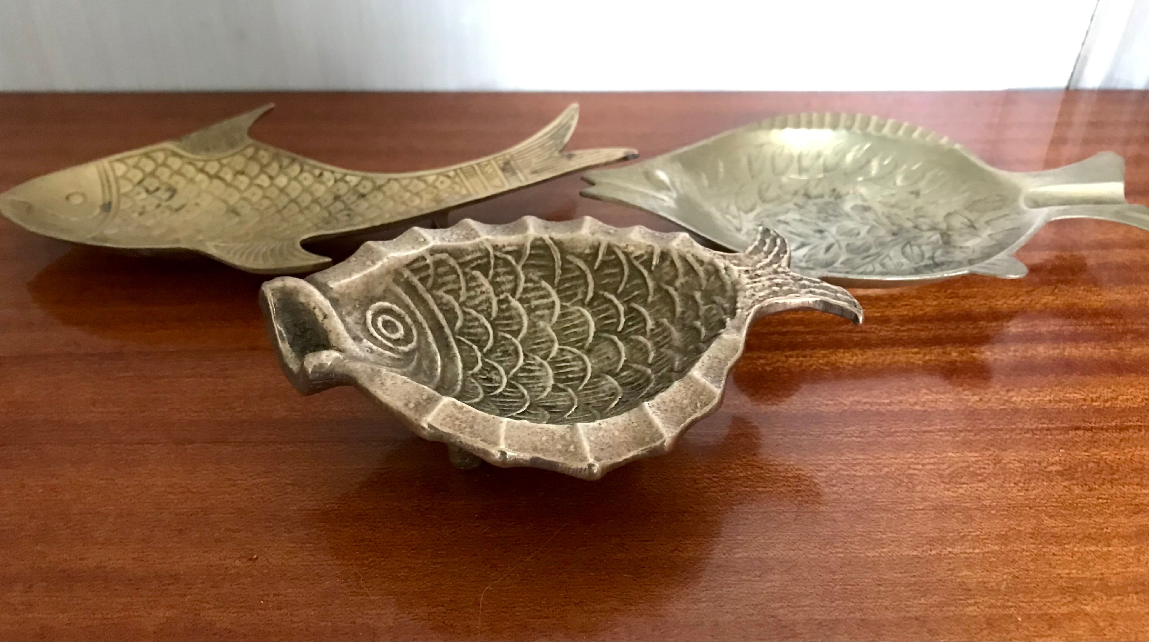 Brass fish ashtrays