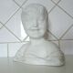 Laughing child bust after Donatello in Sèvres biscuit