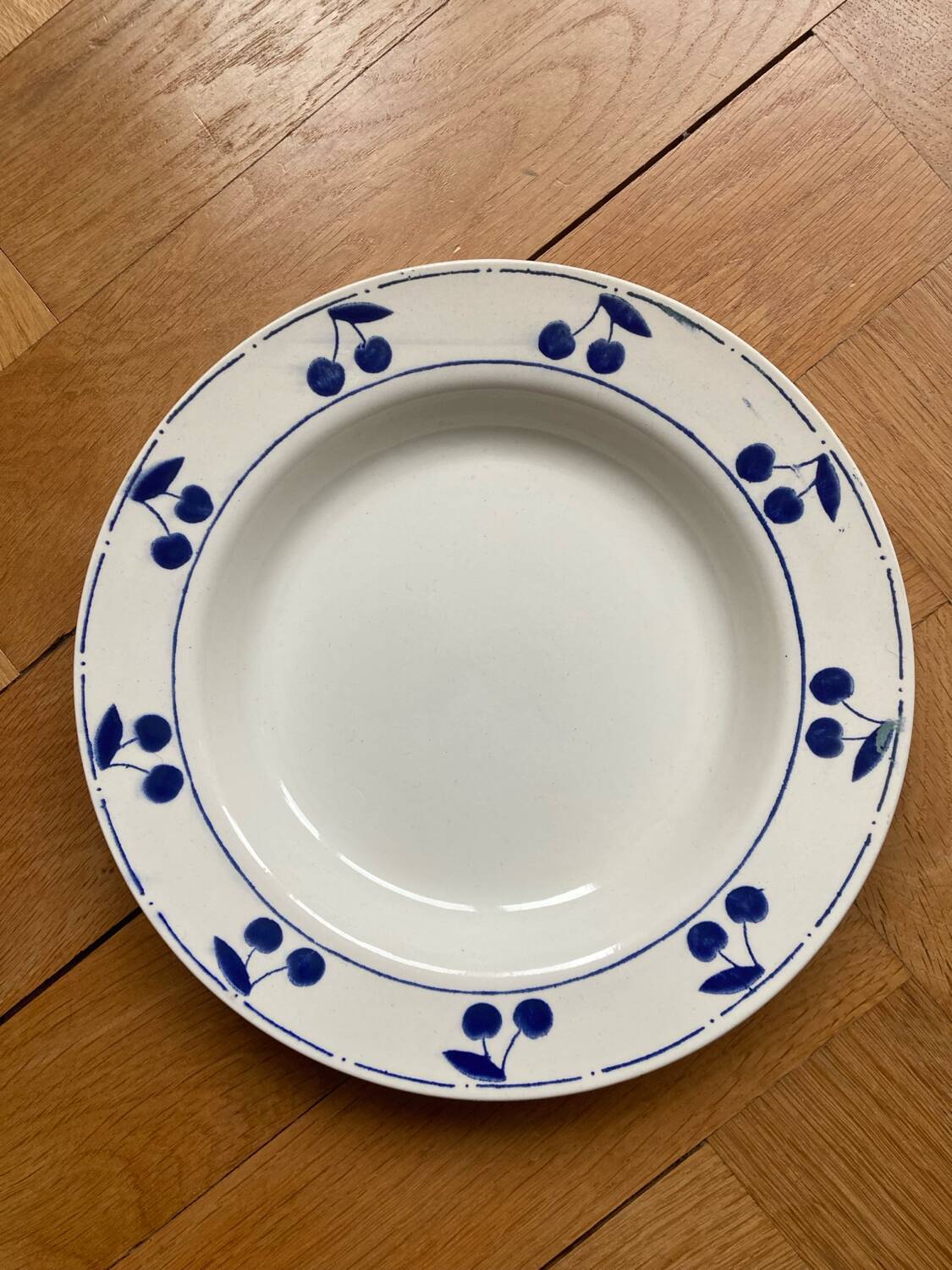 Fruit bowl decorated with blue cherries