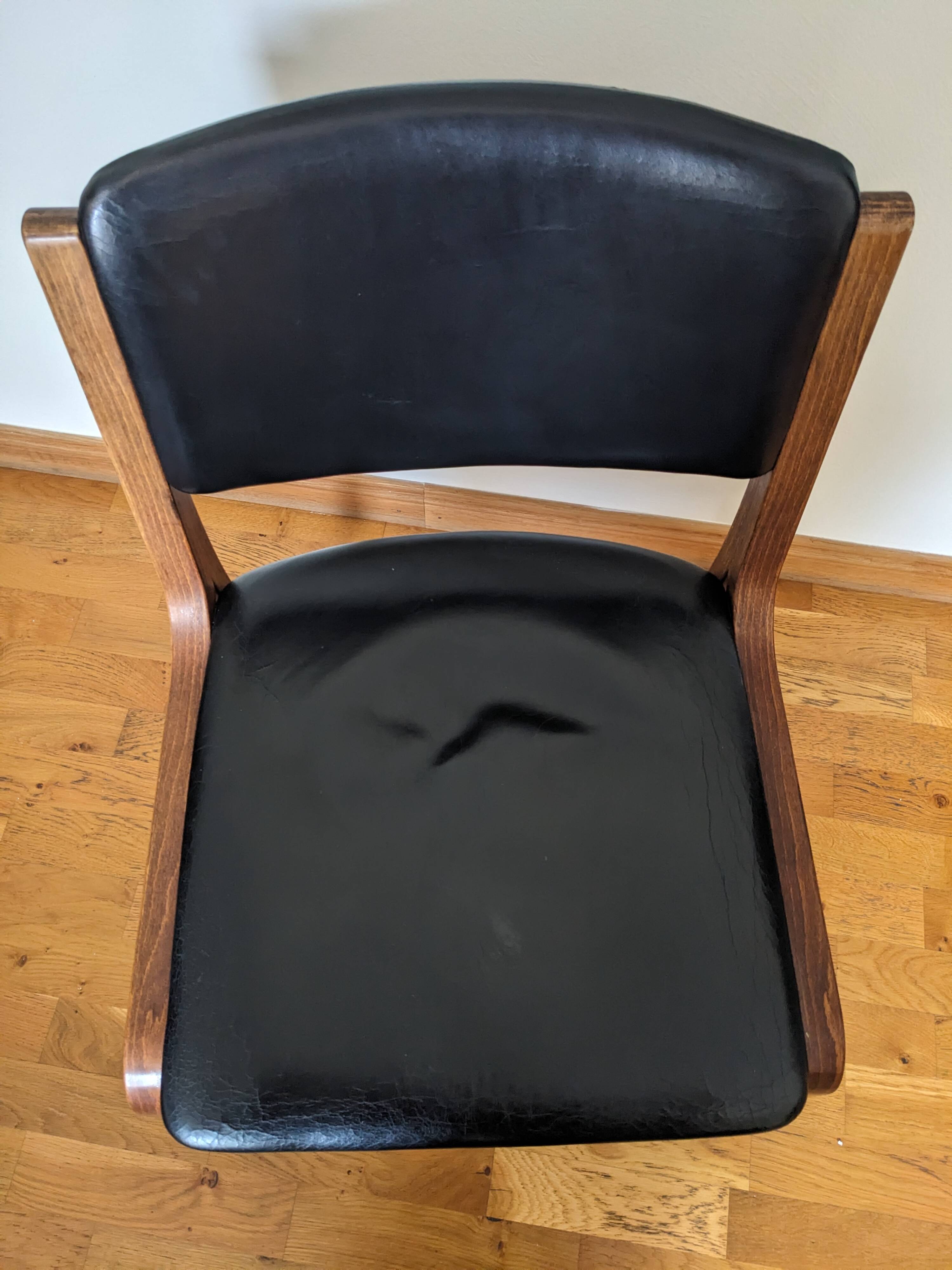 Vintage leather and wood chair pair