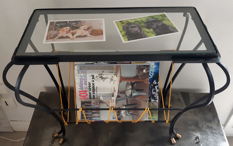 Vintage magazine holder "scoubidou" in black wrought iron.