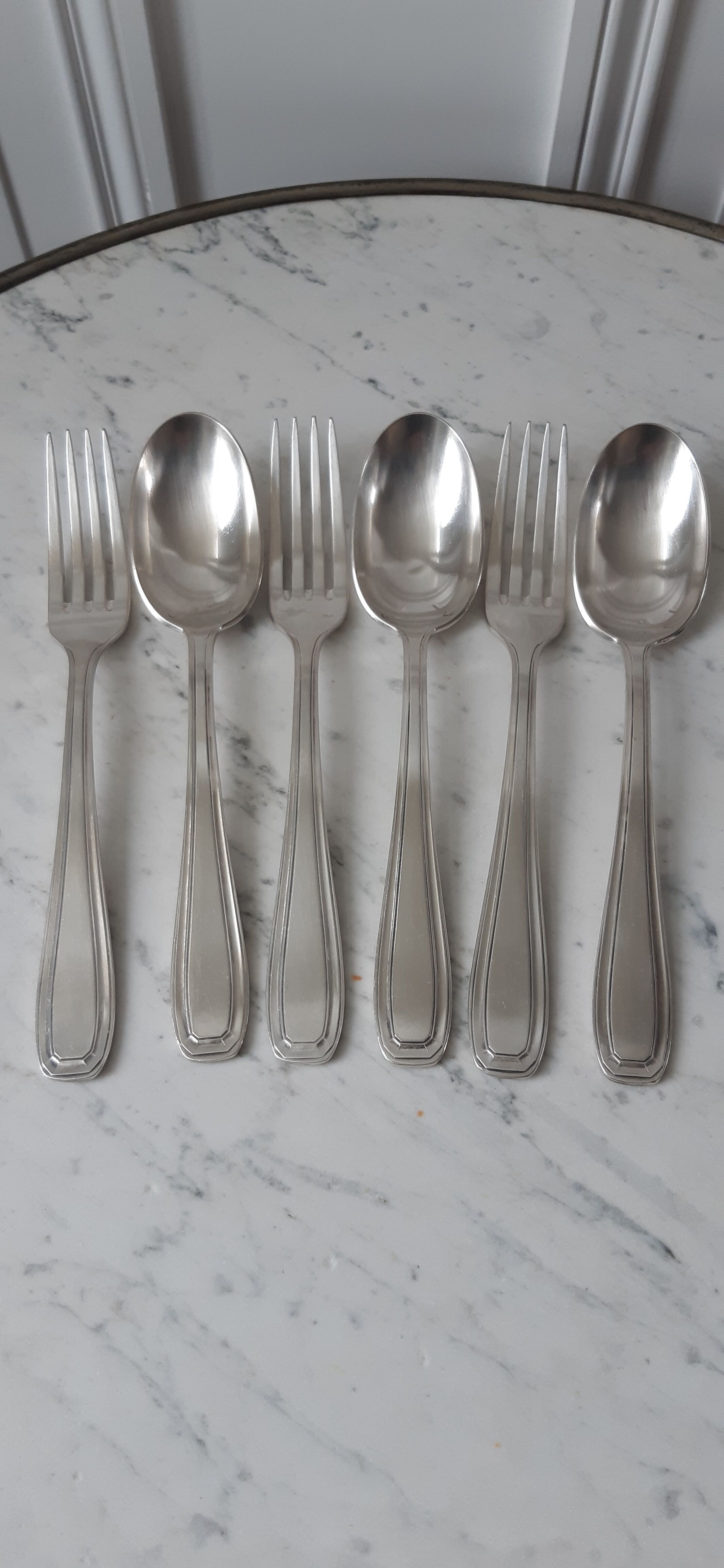 Set of silver metal cutlery 20s