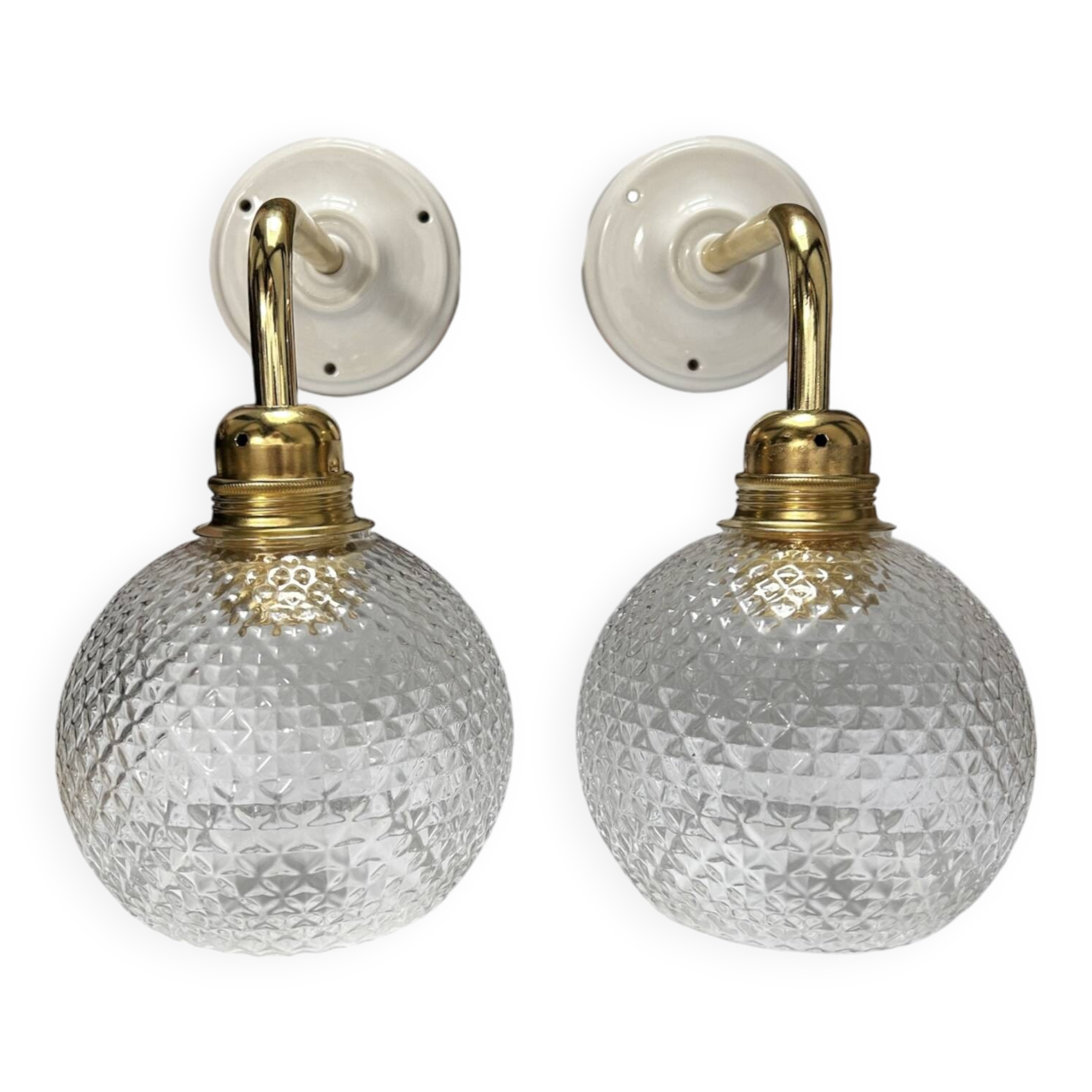 Pair of chiseled glass wall sconces