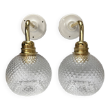 Pair of chiseled glass wall sconces