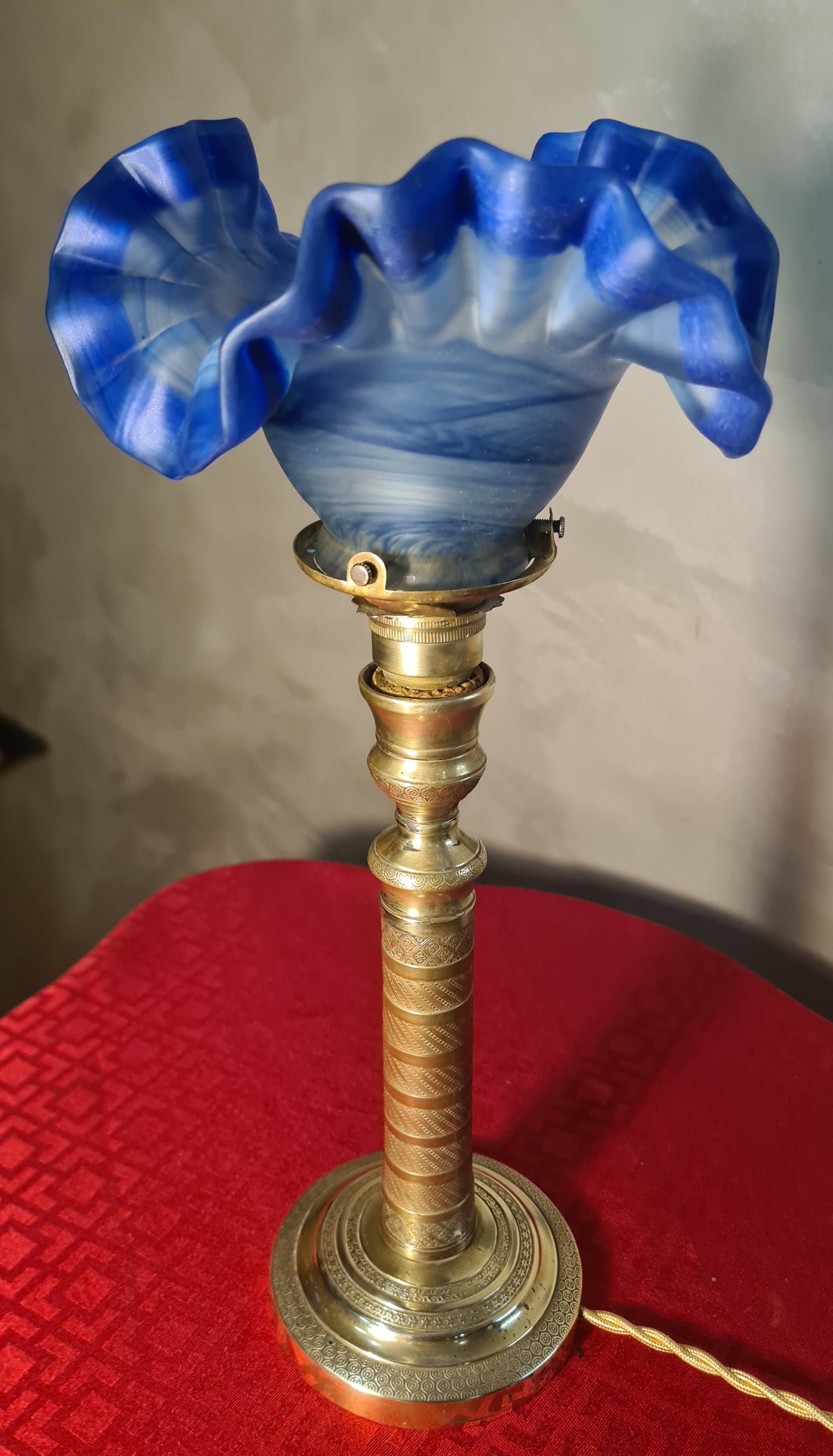etched brass lamp with a blue satin glass tulip shade, signed Vianne 36x16