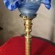 etched brass lamp with a blue satin glass tulip shade, signed Vianne 36x16