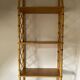 Vintage vertical wall mounted rattan shelf