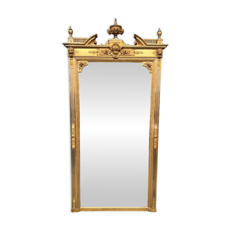 Large, luxurious antique mirror in a Louis XVI style gilt frame.