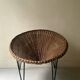 Italian sunflowers armchair in rattan and black metal, 1950s design.