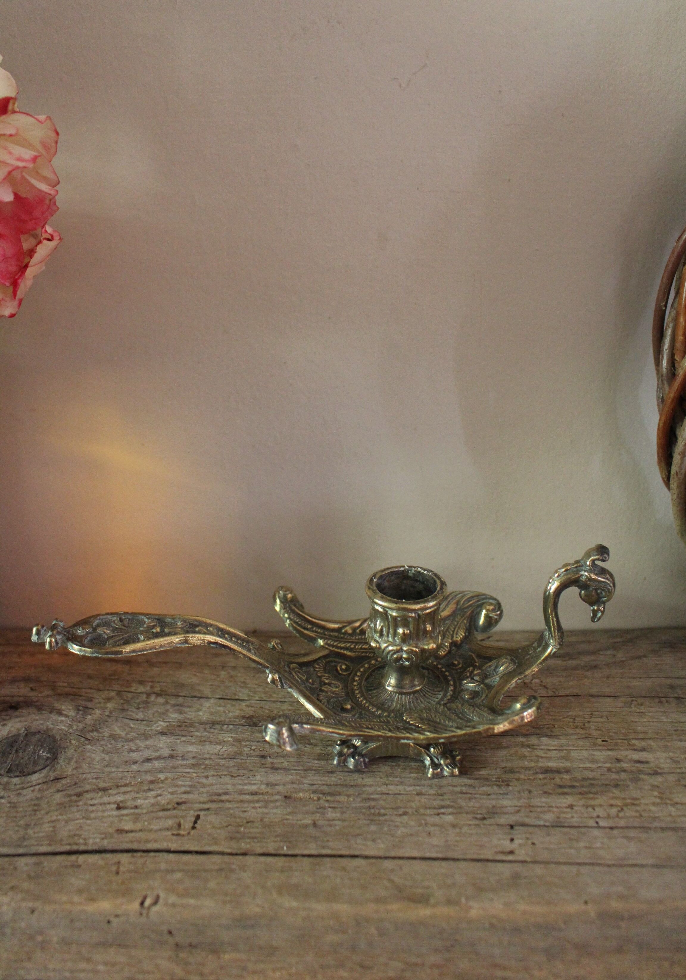 Brass candle holder cave rat peacock