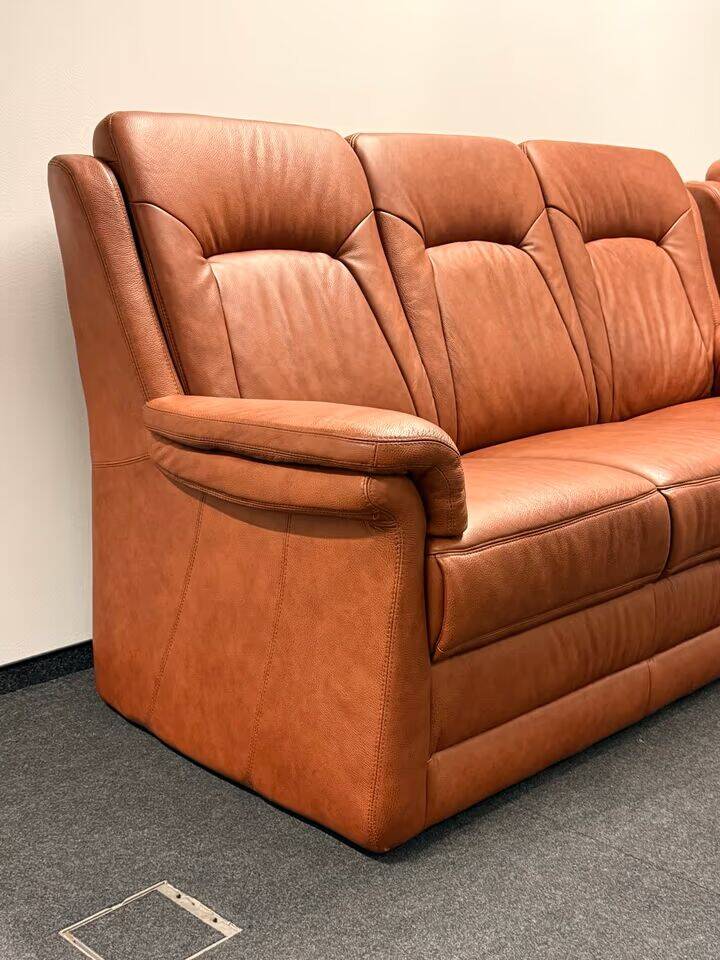 Leather  2-piece set-sofa and armchair from Elastoform