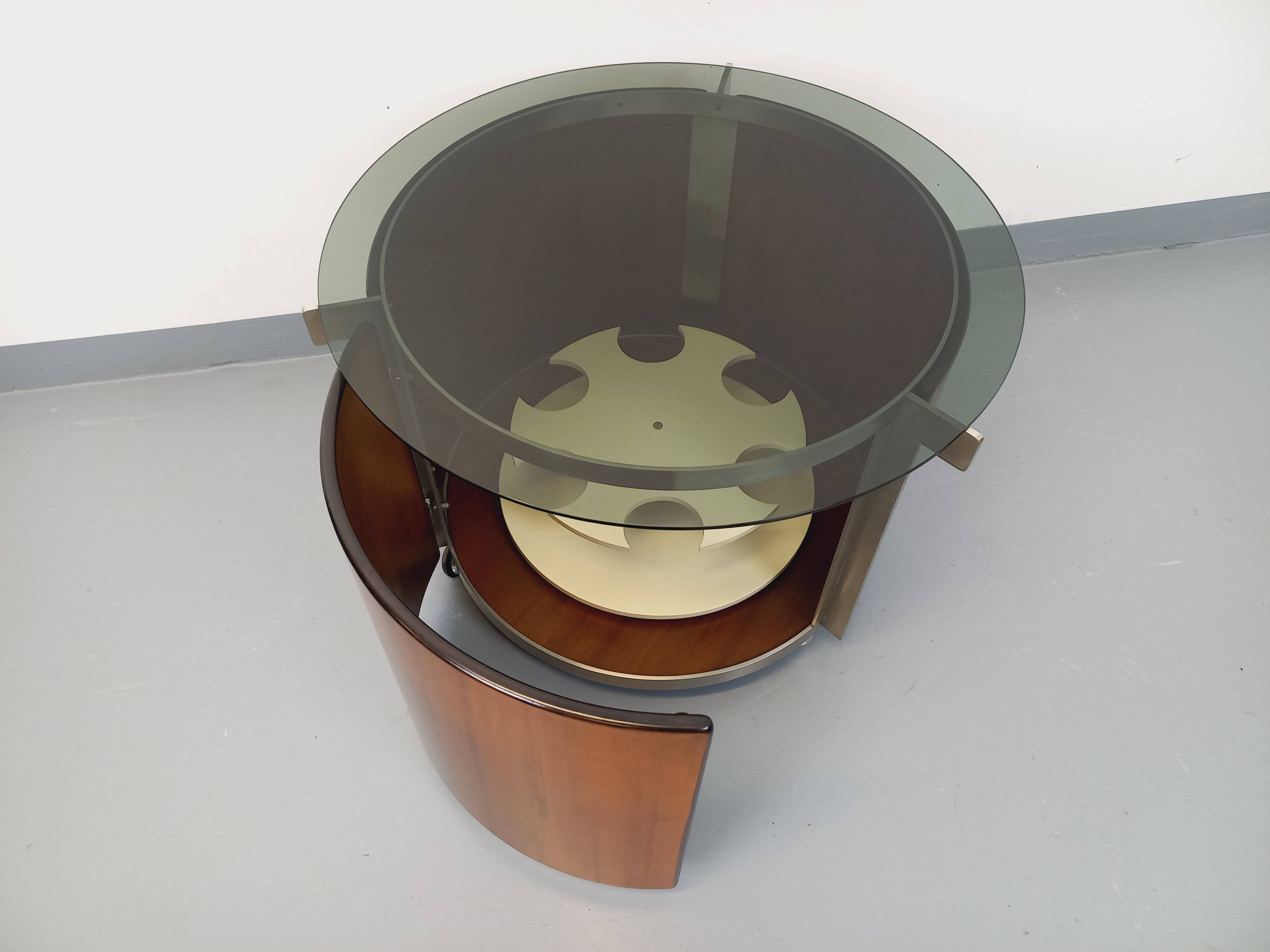 Round Italian teak coffee table swivel bar by Eugenio Gerli for Tecno