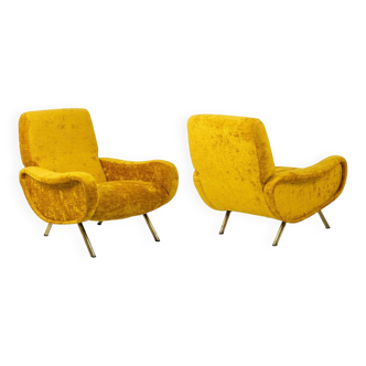 Marco Zanuso pour Artflex. Fauteuils jaune et en laiton doré. Années 1950.